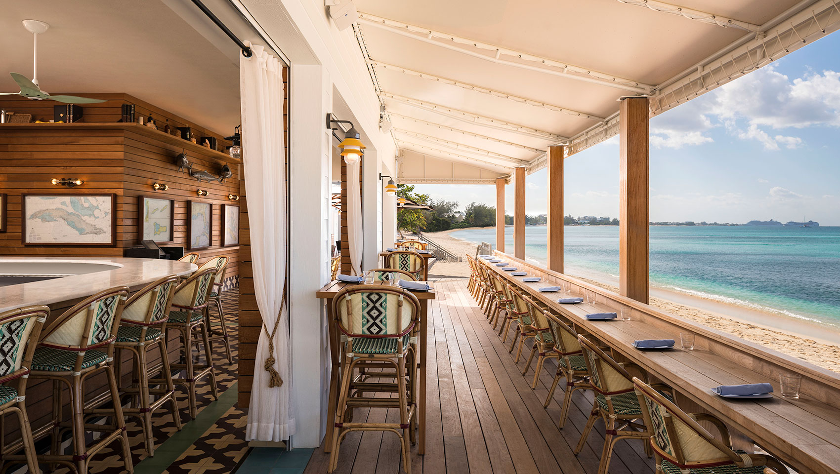 coccoloba outdoor restaurant seating with ocean views on the beach