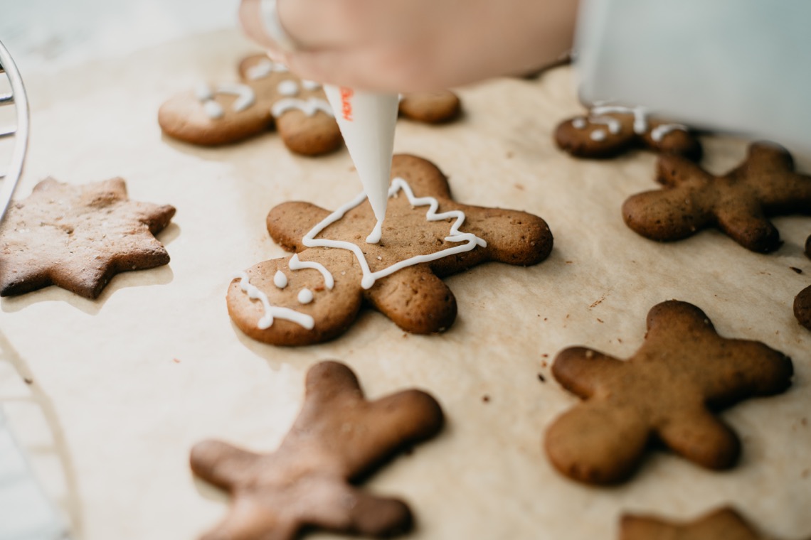 Gingerbread Cookie being decorated