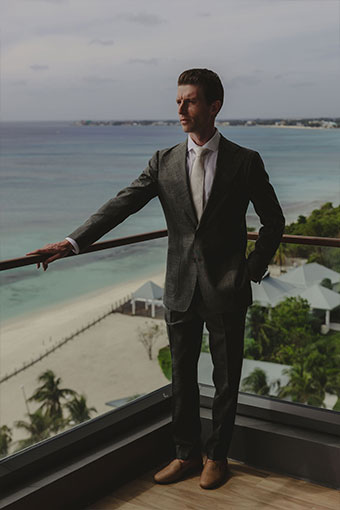 groom on balcony at Kimpton seafire