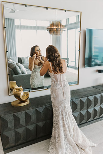 bride preps in bathroom at Kimpton seafire