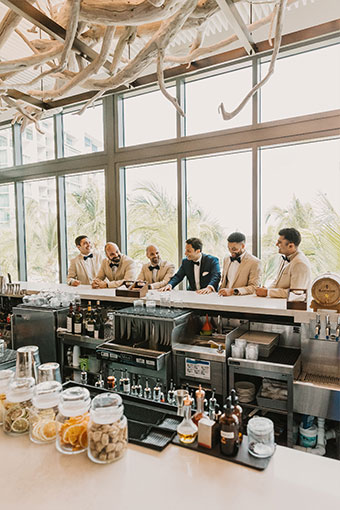 Groomsmen at the bar at Kimpton Seafire