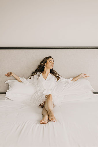 bride in bed at Kimpton seafire