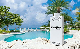 Seafire Boxed Water in front of pool