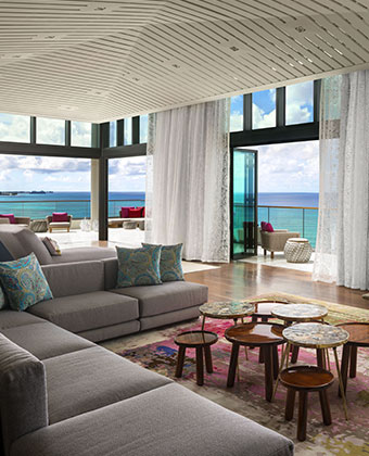 presidential suite living room with oceanfront balcony