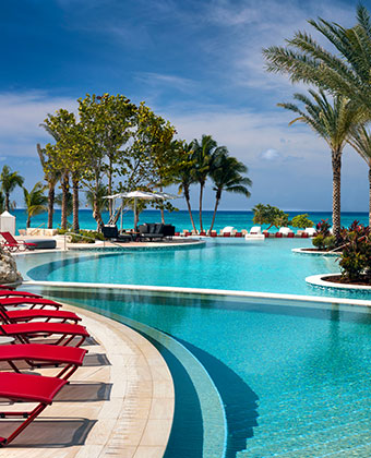 pool and lounge chairs surrounding it